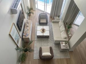 Styles Beach 1A - Beachfront Luxury Condo w Pool