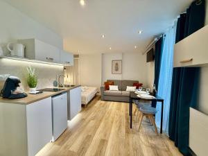 Appartements Studio 5 - Cinema Sport Parking - DABNB : photos des chambres