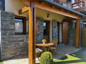 Bonita casa adosada con gran jardín