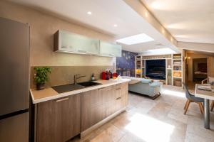 Maisons de vacances Maison avec patio et jacuzzi : photos des chambres