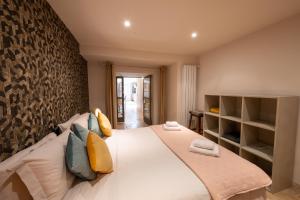 Maisons de vacances Maison avec patio et jacuzzi : photos des chambres