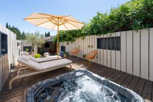 Maisons de vacances Maison avec patio et jacuzzi : photos des chambres