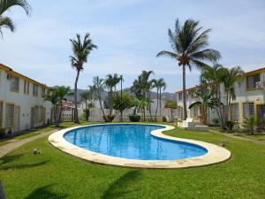 Casa en condominio 2R alberca compartida