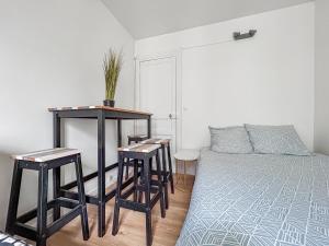 Appartements Studio cosy renove, proche metro & Stade de France : photos des chambres