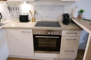 DUTTIS HOME - Stylisches Apartment, Stellplatz, Küche, Self Check-in