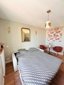 Appartements Studio Prestige Paris Porte de Versailles : photos des chambres