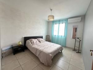 Maisons de vacances Villa pour 8 avec clim et parking proche de la mer : photos des chambres