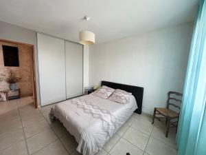 Maisons de vacances Villa pour 8 avec clim et parking proche de la mer : photos des chambres