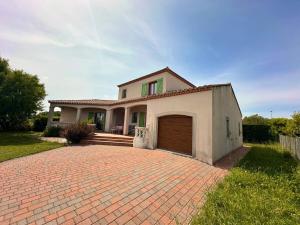 Maisons de vacances Villa pour 8 avec clim et parking proche de la mer : photos des chambres