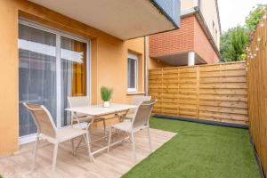 Appartements COSY CAUSSADE Parking gratuit Jardinet Refait a neuf : photos des chambres