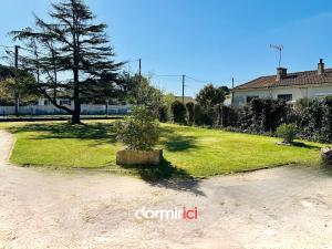 Appartements SOLEIL LEVANT - Terrasse, clim, jardin & BBQ : photos des chambres