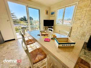 Appartements SOLEIL LEVANT - Terrasse, clim, jardin & BBQ : photos des chambres