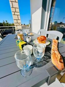 Appartements SOLEIL LEVANT - Terrasse, clim, jardin & BBQ : photos des chambres
