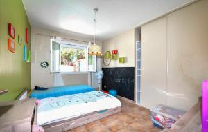 Maisons de vacances Awesome Home In Saleilles : photos des chambres