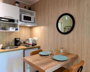 Appartements Studio en bois, confort et modernite : photos des chambres