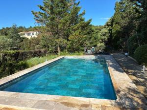 Appartements Gite 2 chambres avec piscine : photos des chambres