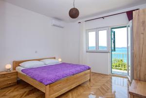 Three-Bedroom Apartment with Terrace and Sea View room in Apartments by the sea Brodarica Sibenik - 4833
