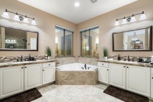 Pinnacle Perfection by Porter Heated Pool Spa w Outdoor Putting Green