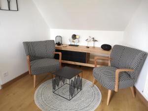 Appartements LE CHAMP MICHEL - appartement lumineux et cosy : photos des chambres