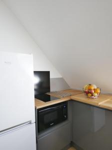 Appartements LE CHAMP MICHEL - appartement lumineux et cosy : photos des chambres