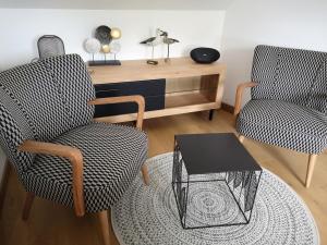 Appartements LE CHAMP MICHEL - appartement lumineux et cosy : photos des chambres