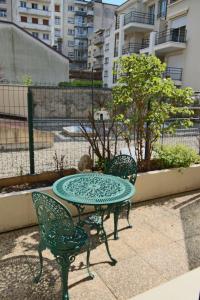 Appartements Studio 24 m2 le grand passage centre-ville terrasse climatisation parking : photos des chambres