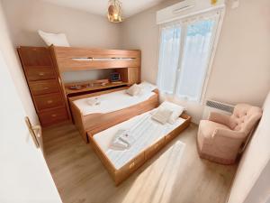 Appartements Le Jardin de Blonville - A 10 min a pied de la plage - tennis & equitation a cote : photos des chambres