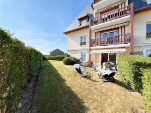 Appartements Le Jardin de Blonville - A 10 min a pied de la plage - tennis & equitation a cote : photos des chambres