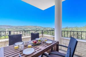 Elysian Stone Villa with Pool & Mountain View