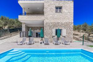 Elysian Stone Villa with Pool & Mountain View