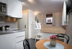 4 Arts Apartments by Adrez