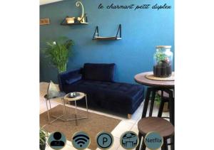 Appartements Charmant petit duplex : photos des chambres