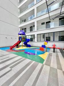 metro living retreat three bedroom apartment with swimming pool, fully equipped gym, ample parking space, and proximity to major shopping malls