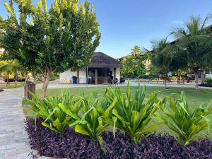 Flat térreo - Porto de Galinhas PE - Condomínio CUPE BEACH LIVING - pé na areia