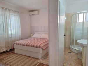 Two-Bedroom Apartment room in Apartments and Rooms Meri