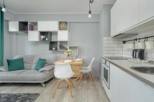Stylish Apartment near Hala Arena Poznań by Noclegi Renters