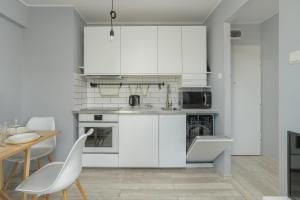 Stylish Apartment near Hala Arena Poznań by Noclegi Renters