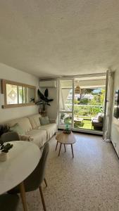 LE BOHÈME - balcon vue jardin - clim - place de parking - wifi - 5min plage