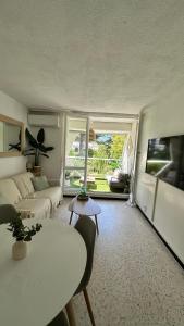 LE BOHÈME - balcon vue jardin - clim - place de parking - wifi - 5min plage