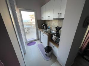 Střešní apartmán s terasou, zahradou a výhledem na moře