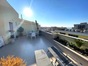 Střešní apartmán s terasou, zahradou a výhledem na moře