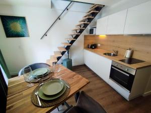 Appartements T1 de standing sur le port : photos des chambres