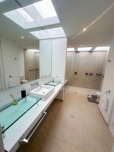 A penthouse with a luxury Jacuzzi and panoramic view