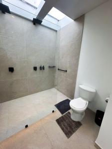 A penthouse with a luxury Jacuzzi and panoramic view