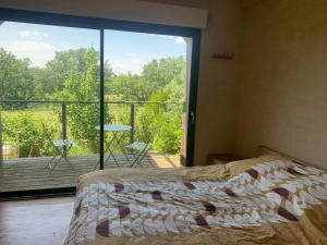 Villas Jolie maison en bois avec piscine : photos des chambres