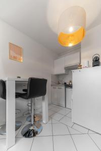 Residence Gilbert - Appartements design centre ville : photos des chambres