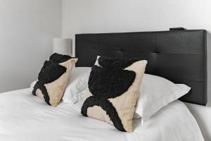 Residence Gilbert - Appartements design centre ville : photos des chambres