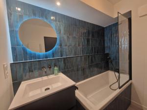Appartements Appartement avec piscine Bleu du Lac : photos des chambres