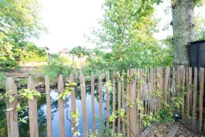 Maisons PontLac, 2 maisons reliées en bord de canal à Cazaux