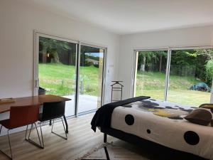 Maisons de vacances Maison au vert-Entre-Deux-Mers, Repos et confort au coeur de la nature : photos des chambres
